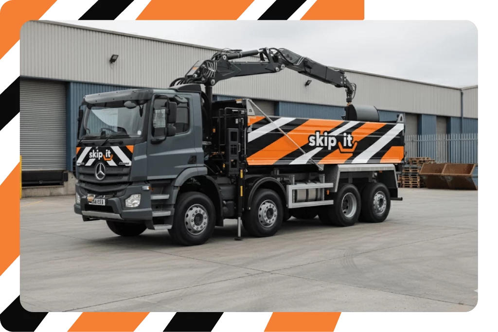 Grab lorry picking up demolition debris