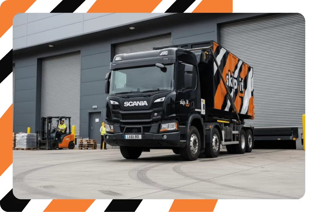 Roll on roll off waste container delivery truck